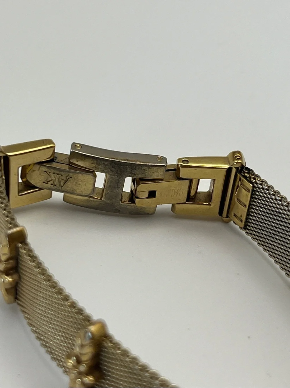 Anne Klein Women's Gold Mesh Bracelet Watch with Leaf Accents